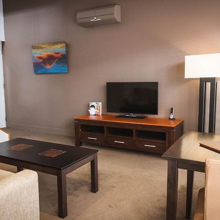 The Henry Jones Art Hotel Hobart Esterno foto A living room in a typical apartment at the Village at Grand Traverse Commons